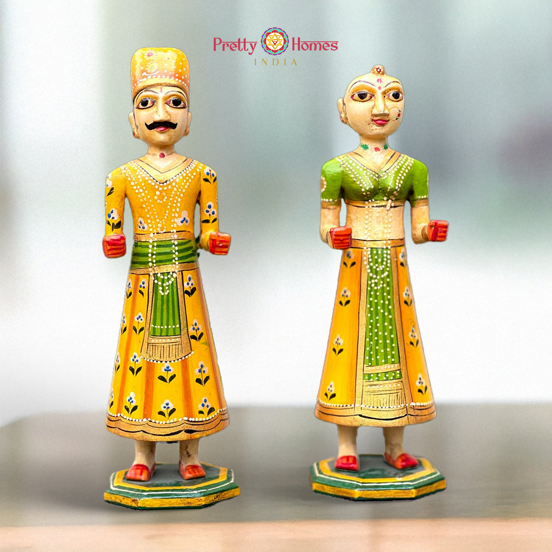 traditional wooden isar and gangaur dolls handpainted in bright rajasthani colours