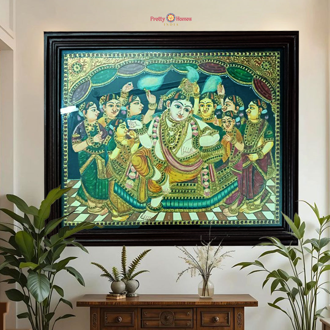 close-up of tanjore krishna with gopikas capturing handpainted textures and gilded ornament