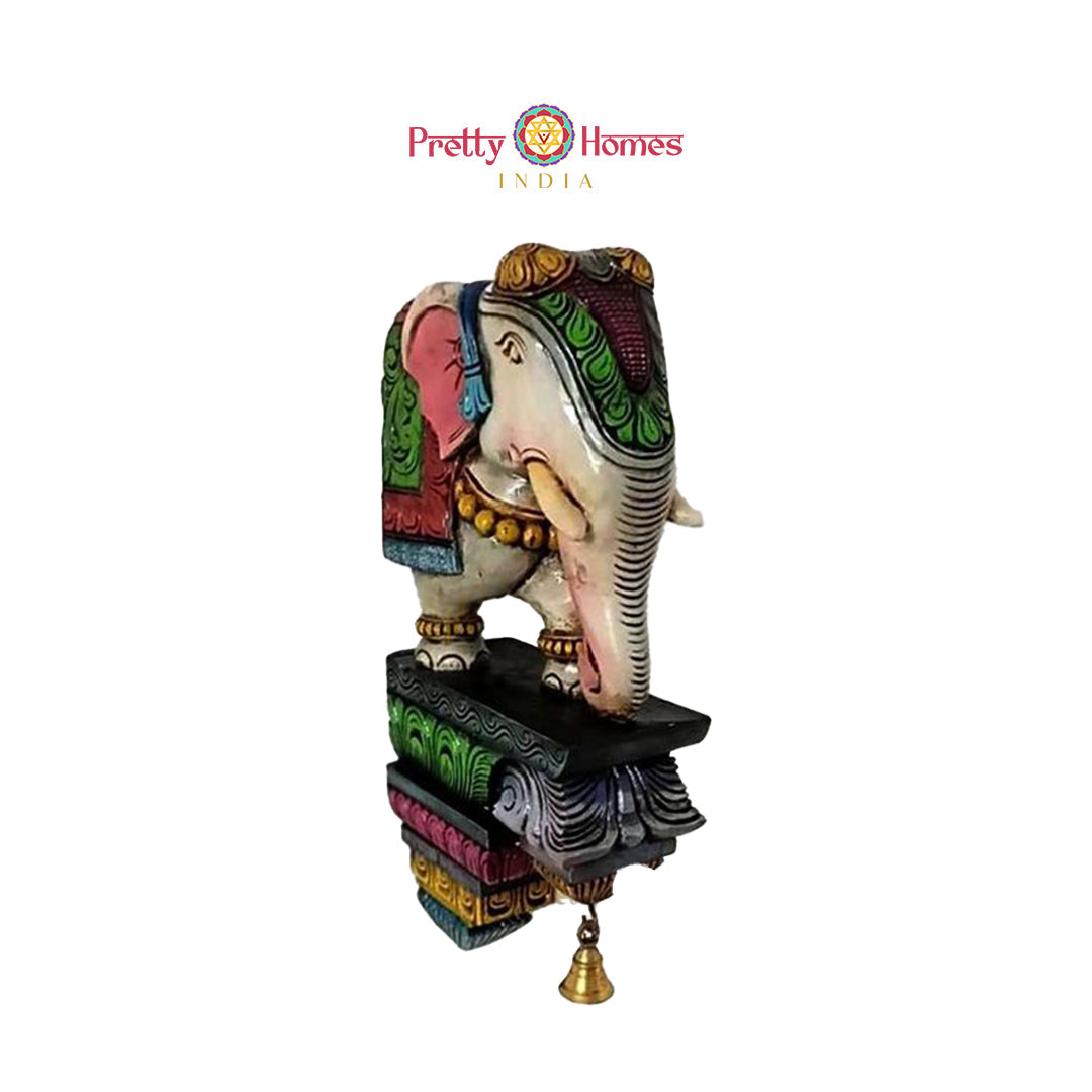 Multicolour woodcarved elephant bracket showcasing Indian craftsmanship