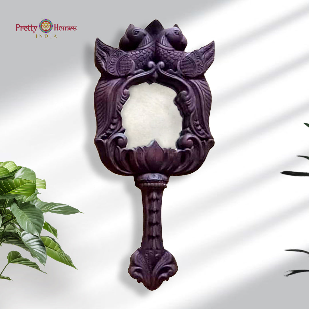 Wooden mirror frame with twin carved parrots in dark polish