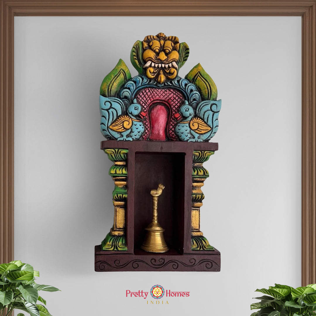 temple-style wooden shelf with pillar and annapakshi carvings