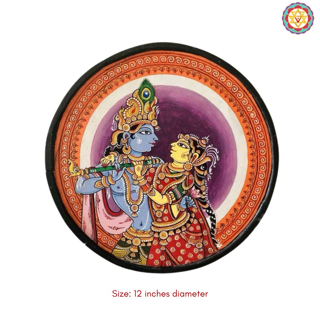 close up radha krishna pattachitra wall plate showing fine detailing