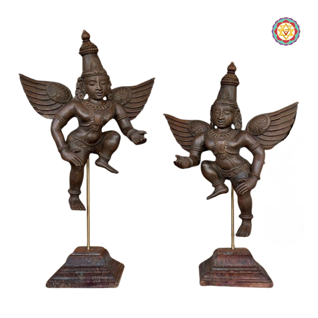 Pair of antique-finish wooden Gandharva table sculptures on square wooden bases — heritage decor, carved winged angels