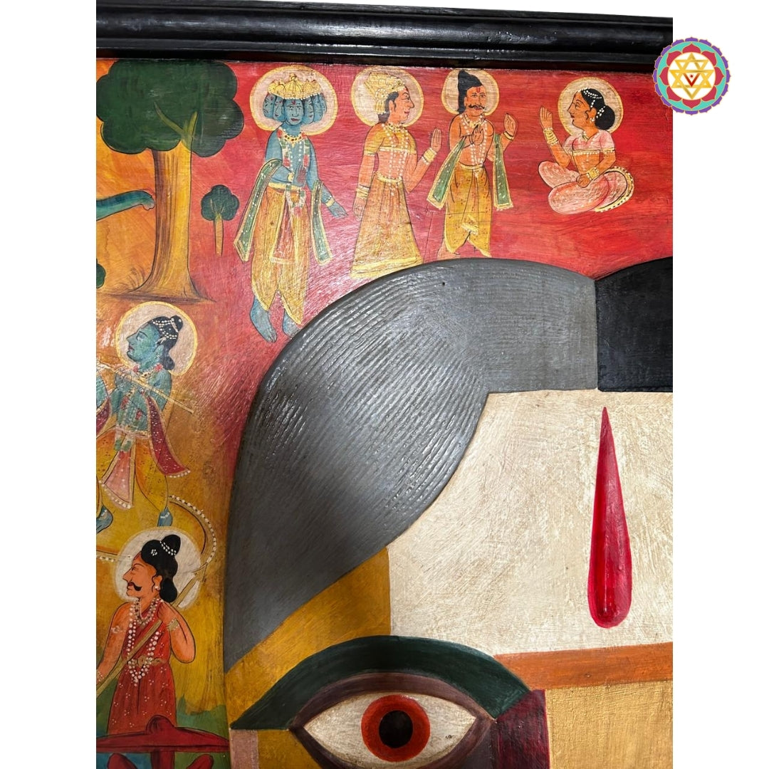 Vibrant Ganesha mask painting with Indian deities