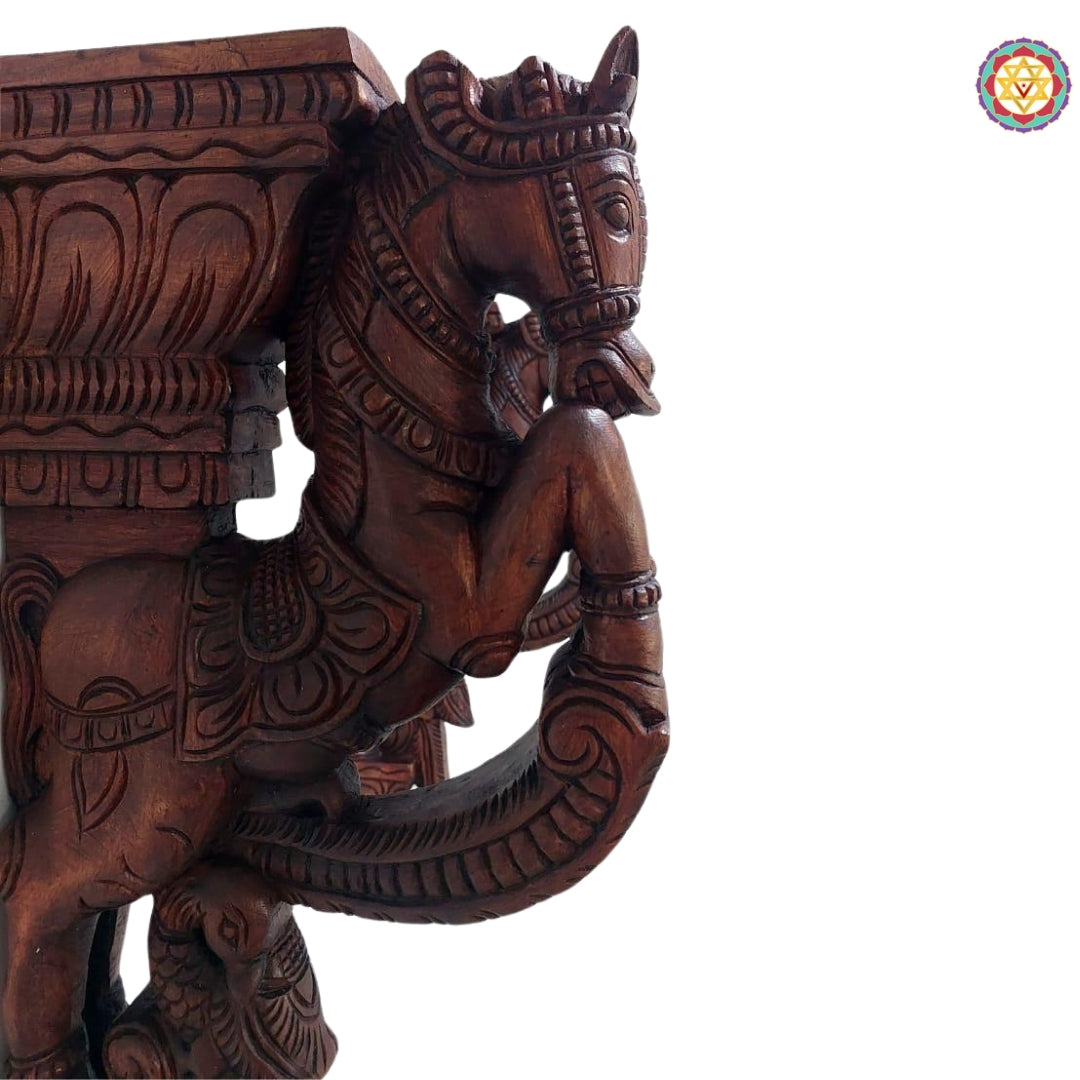 Fine carving detail of horse bracket showing peacock motif and antique polished surface