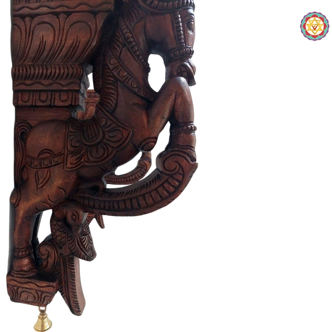 Texture detail of horse wall bracket showing handcrafted carvings and polished varnish