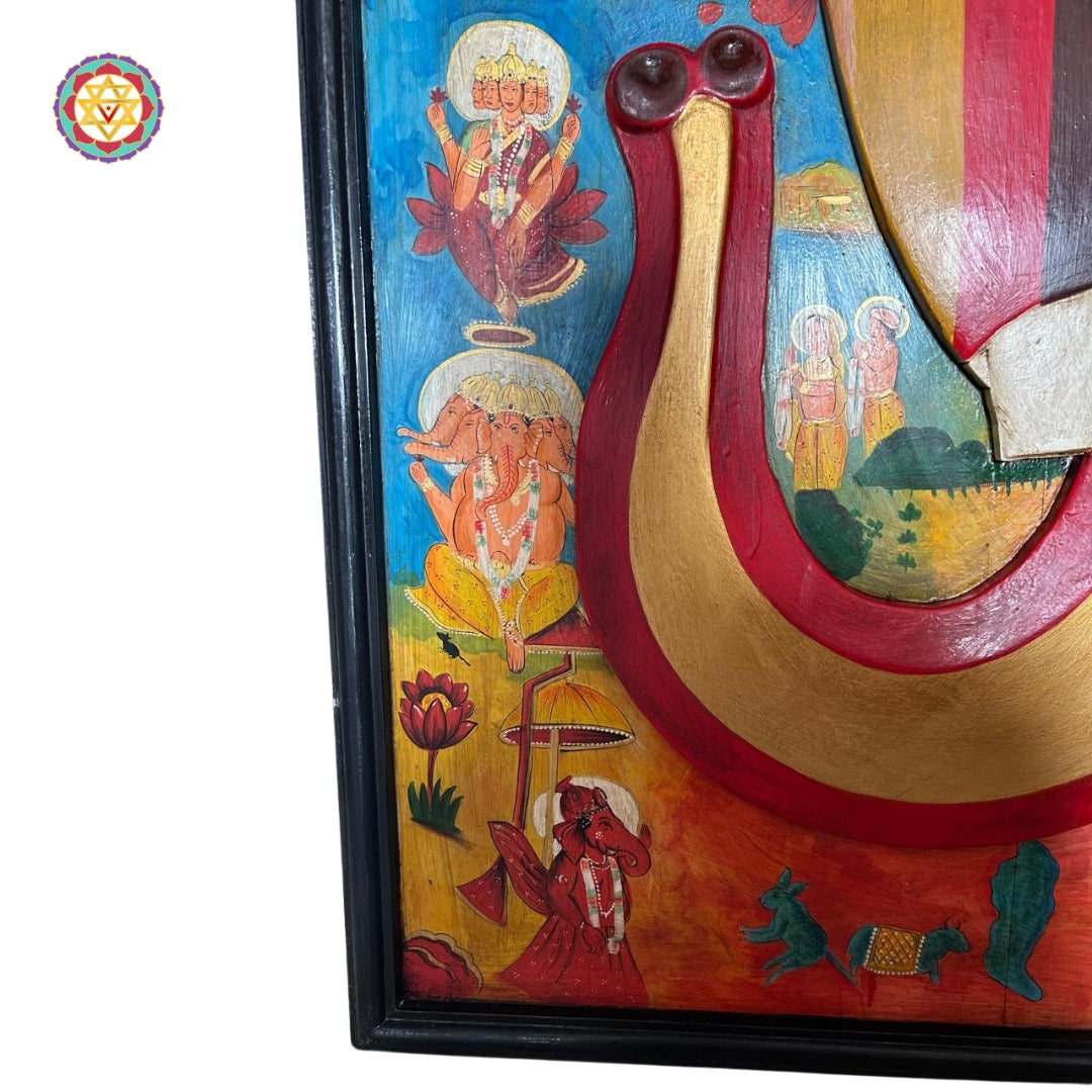 Traditional Ganesha mask painting with vibrant motifs