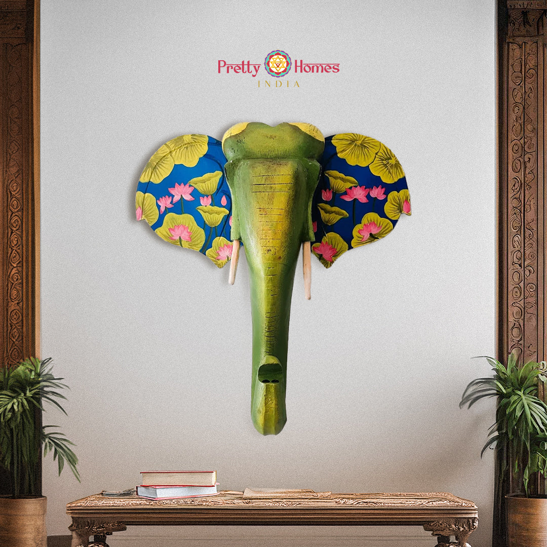Hand-painted wooden elephant wall hanging with lotus and leaf detailing