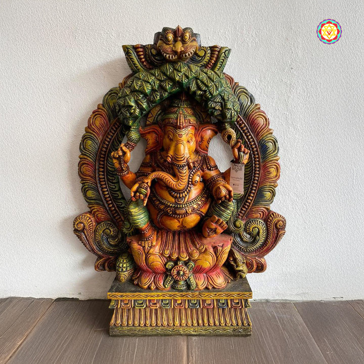 Intricately carved Woodcarved  Seated Lotus Ganesha Enshrining Prabhavali.Statue