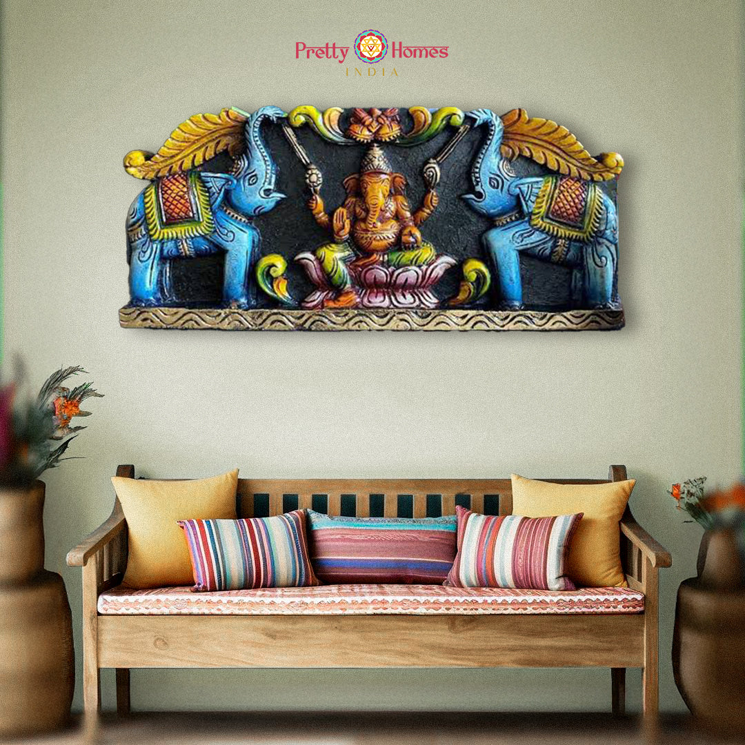 Gaja Ganesha wooden wall panel above bench with elephants