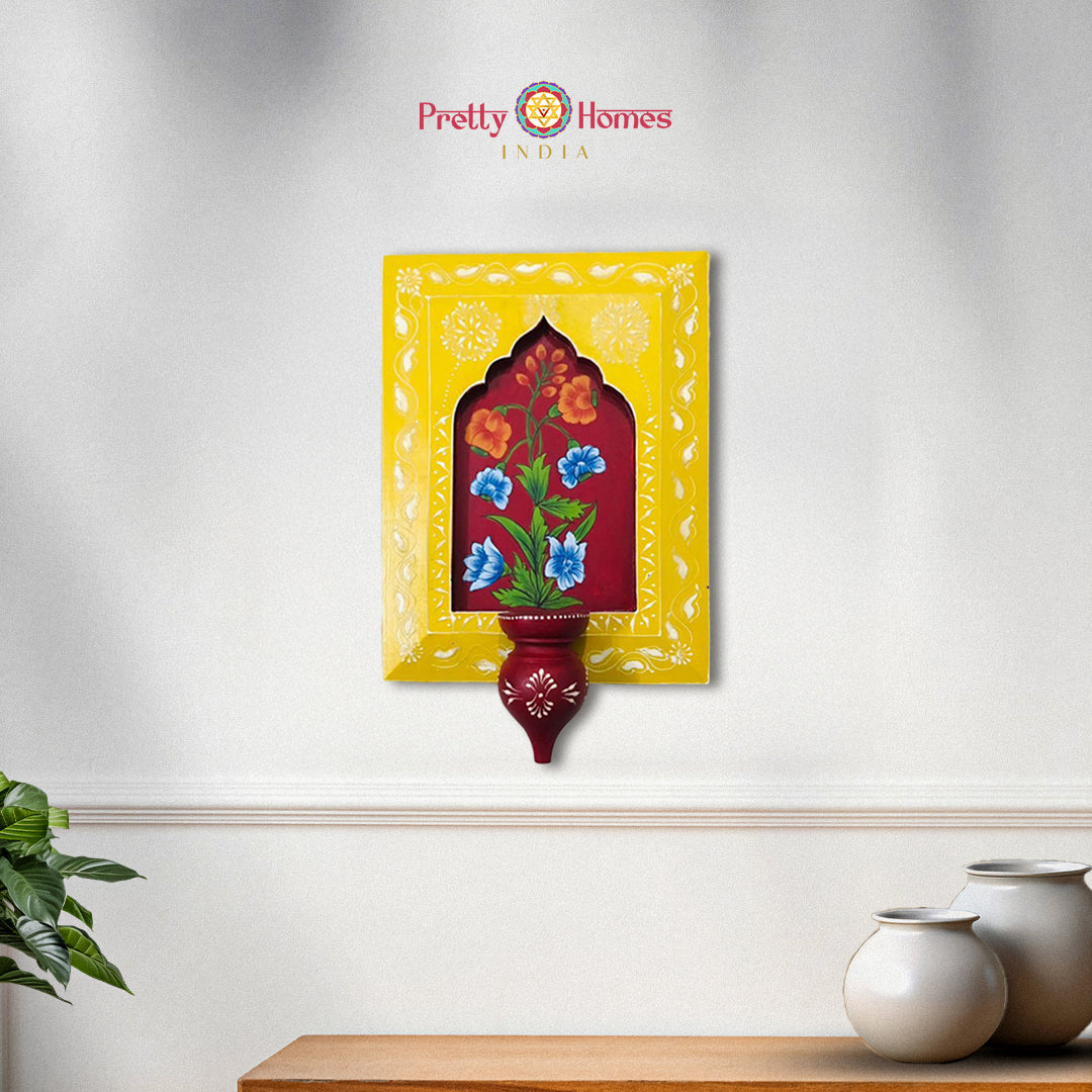Yellow hand-painted wooden wall frame with Mehrab design on display