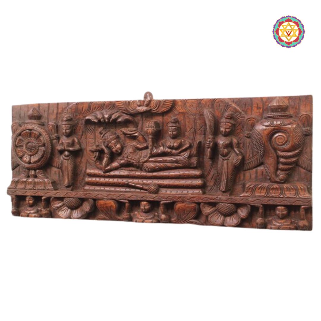 resting vishnu wooden panel close up of intricate carvings