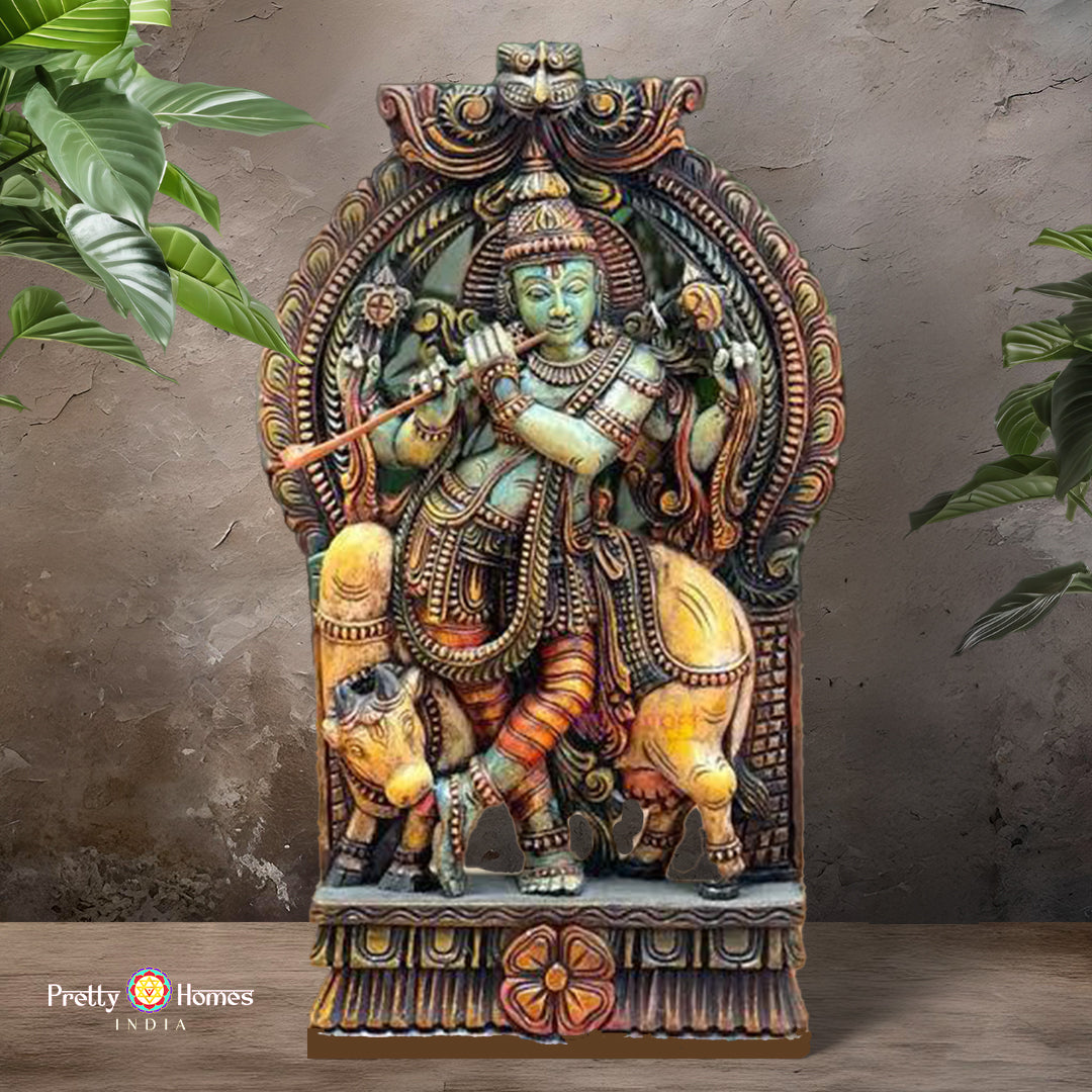 Front view of wooden Lord Krishna sculpture, wooden hand carved lord krishna standing under cow statue stand alone wall