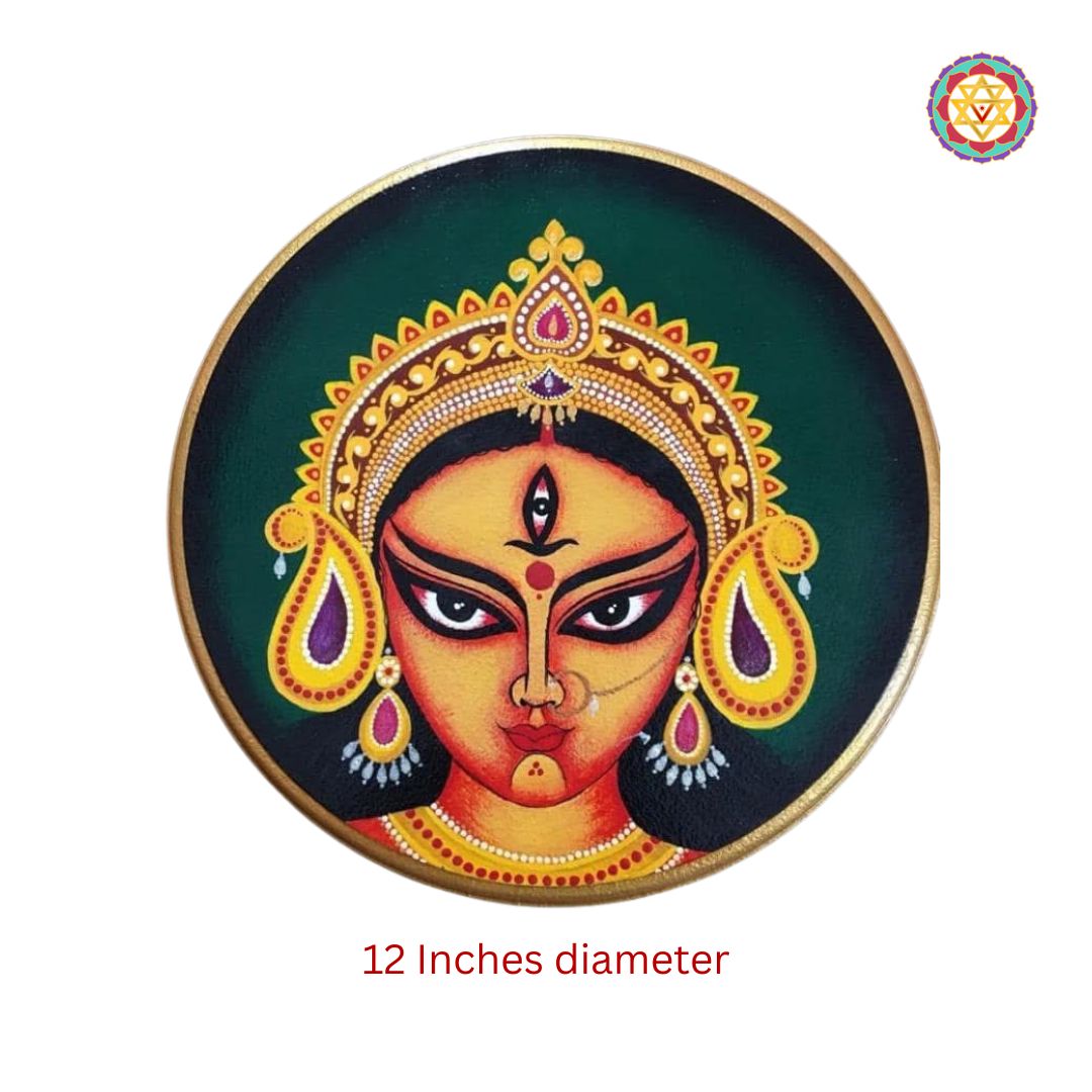 Close-up detailing of Durga face and ornaments