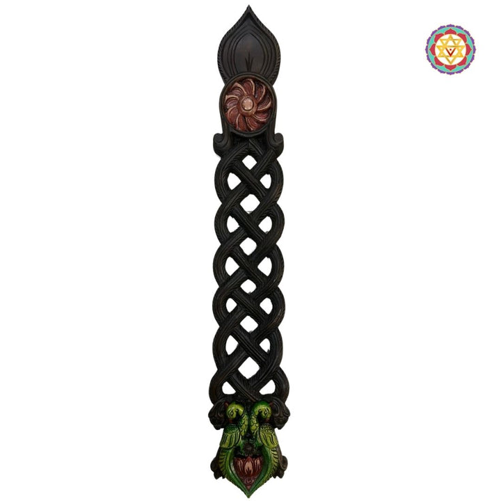 Traditional ladle-style vertical wall decor with diya space