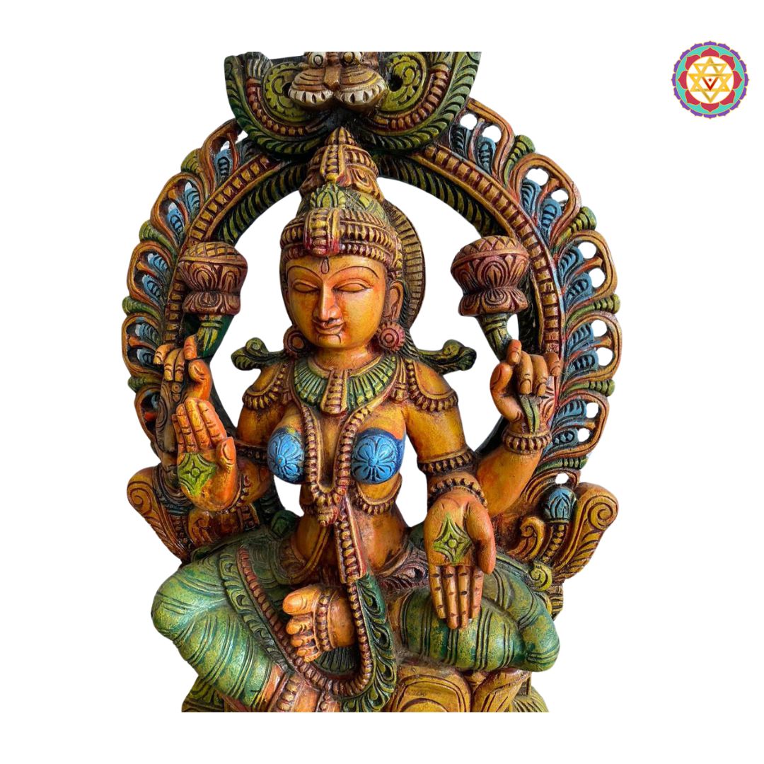 side view of lakshmi statue with yali in hand-carved multicolour wood