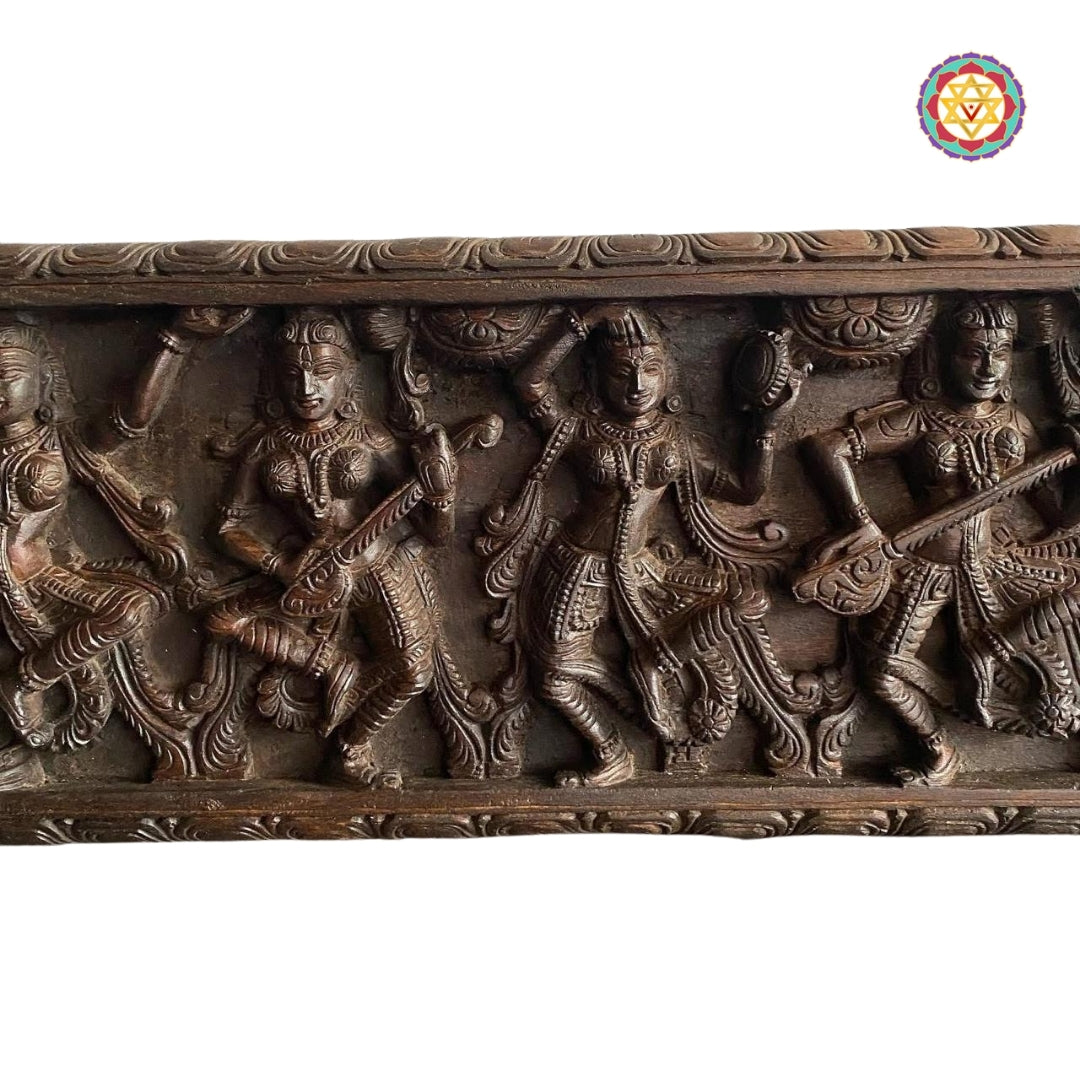 Wooden horizontal sculpture of Indian classical dancers