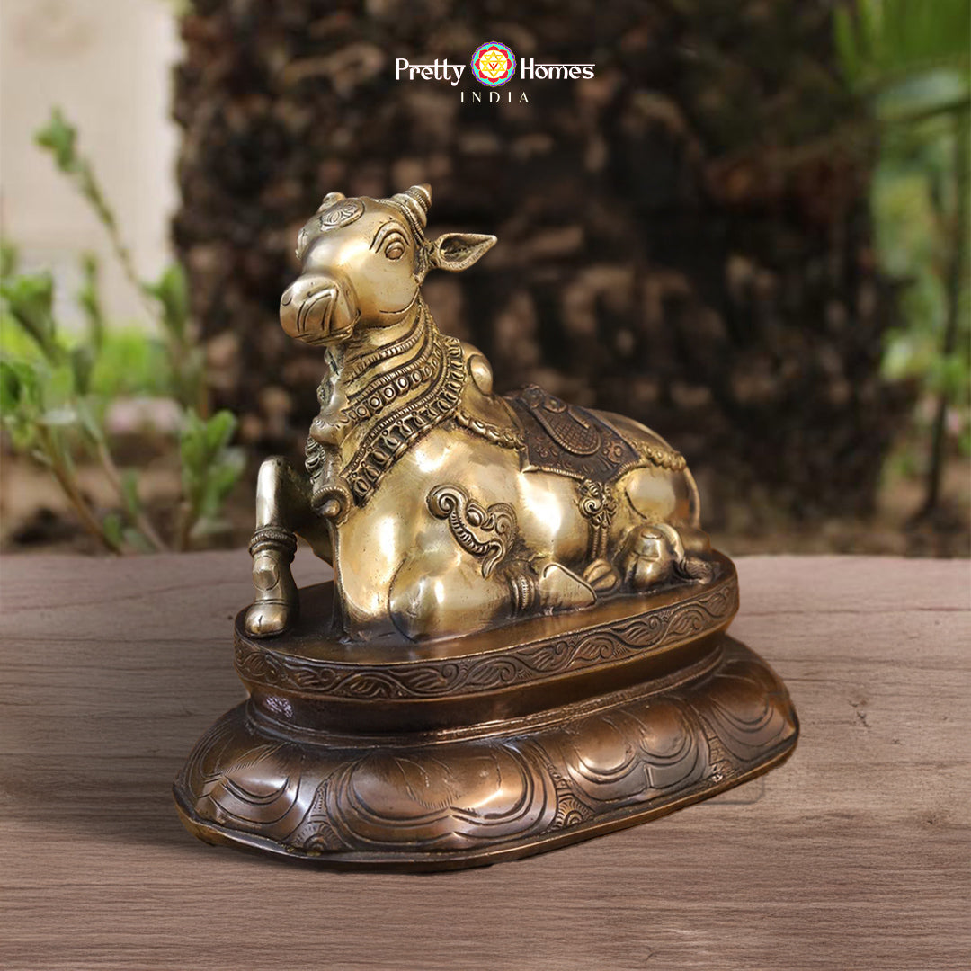 mystic blue brass Nandi idol with golden accents and detailed carvings