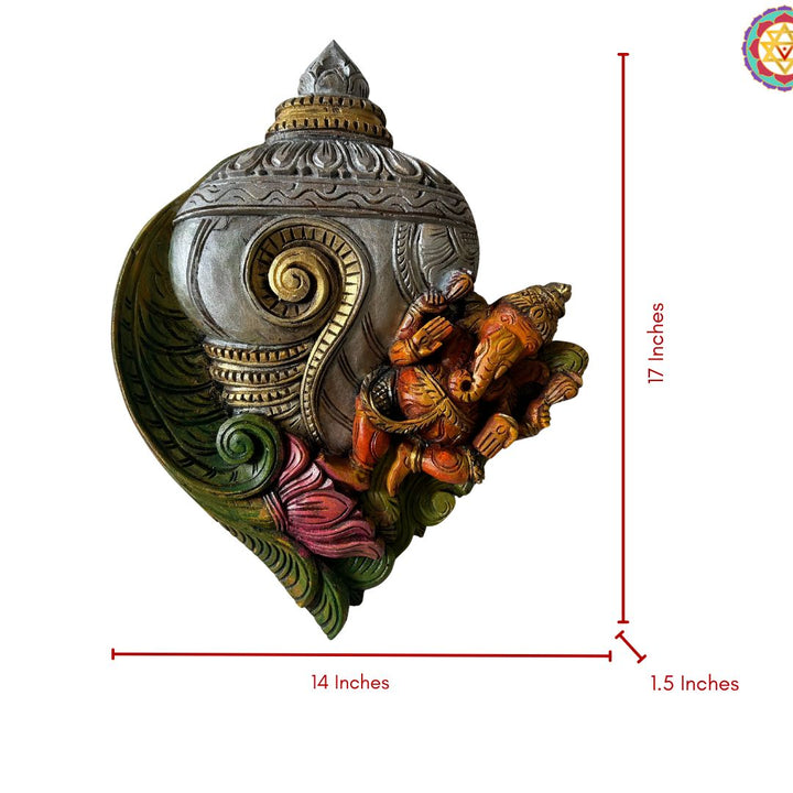 woodcarved conch/shankh wall frame with Ganehsa on lotus