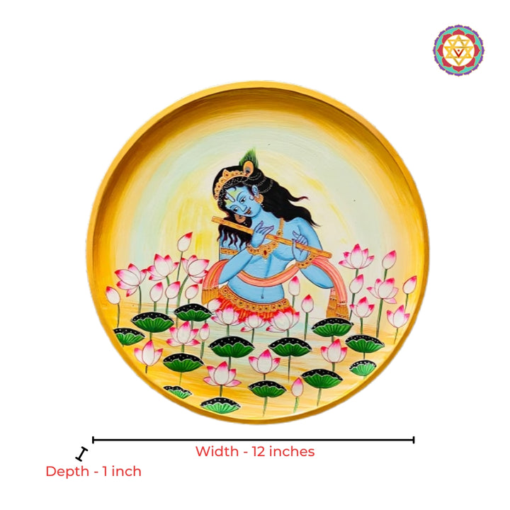 Close-up view of flute Krishna round pichwai painting with sacred cow motifs