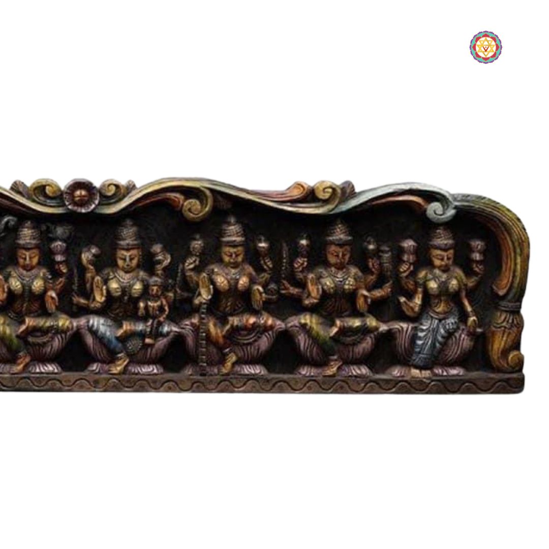 Ashtalaxmi temple panel — traditional Indian wooden wall sculpture.