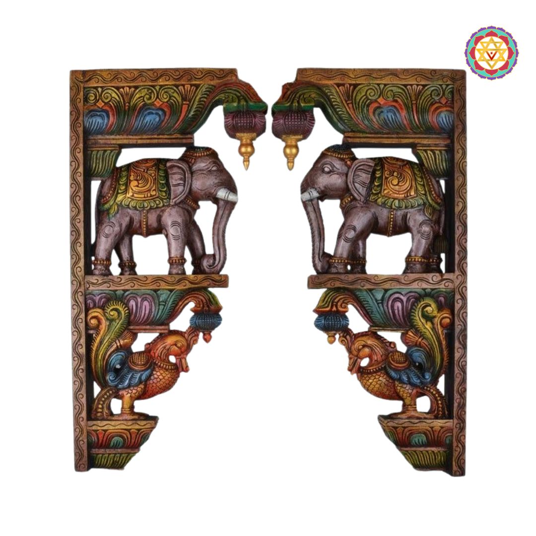“Large carved wooden wall bracket with elephant and peacock motif”