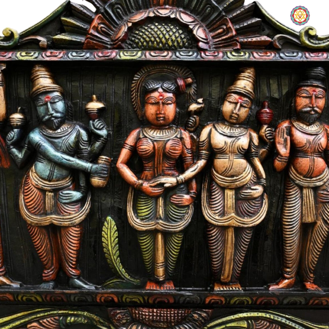 Detailed wedding scene carving — Meenakshi Kalyanam artisan wood decor.