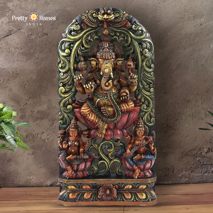 Woodcarved Ganesh statue with Goddess Laxmi & Saraswati.