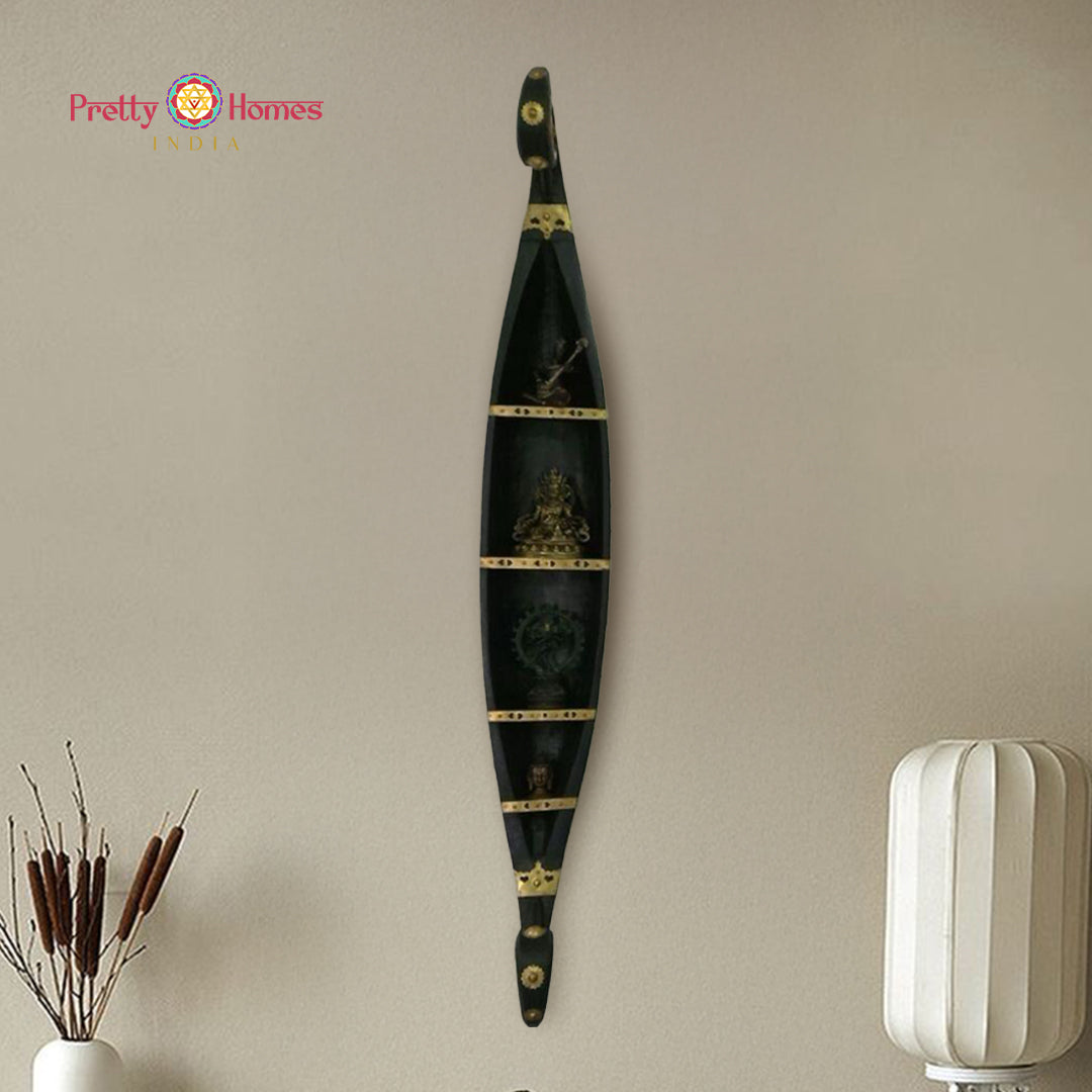 Wooden boat wall decor with shelves and brass work.