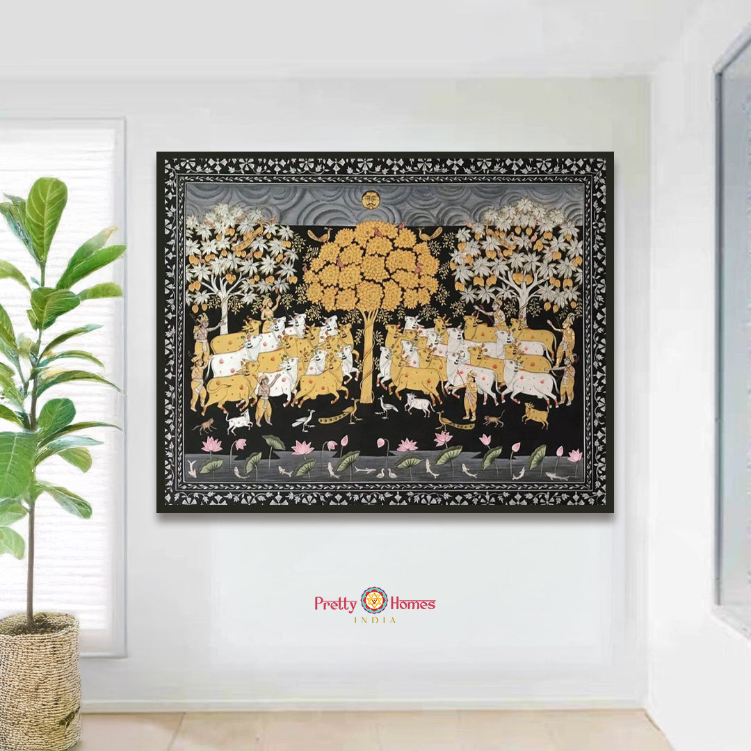 handpainted pichwai cows under trees with intricate floral border close-up highlighting tree foliage and delicate floral borderwork