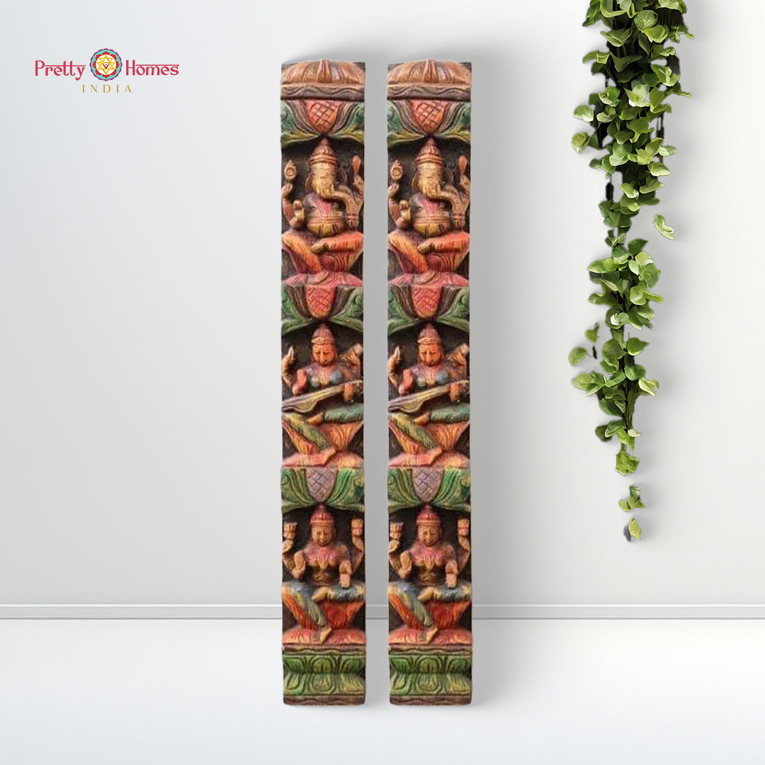 handcarved wooden wall frame featuring goddess lakshmi seated on lotus