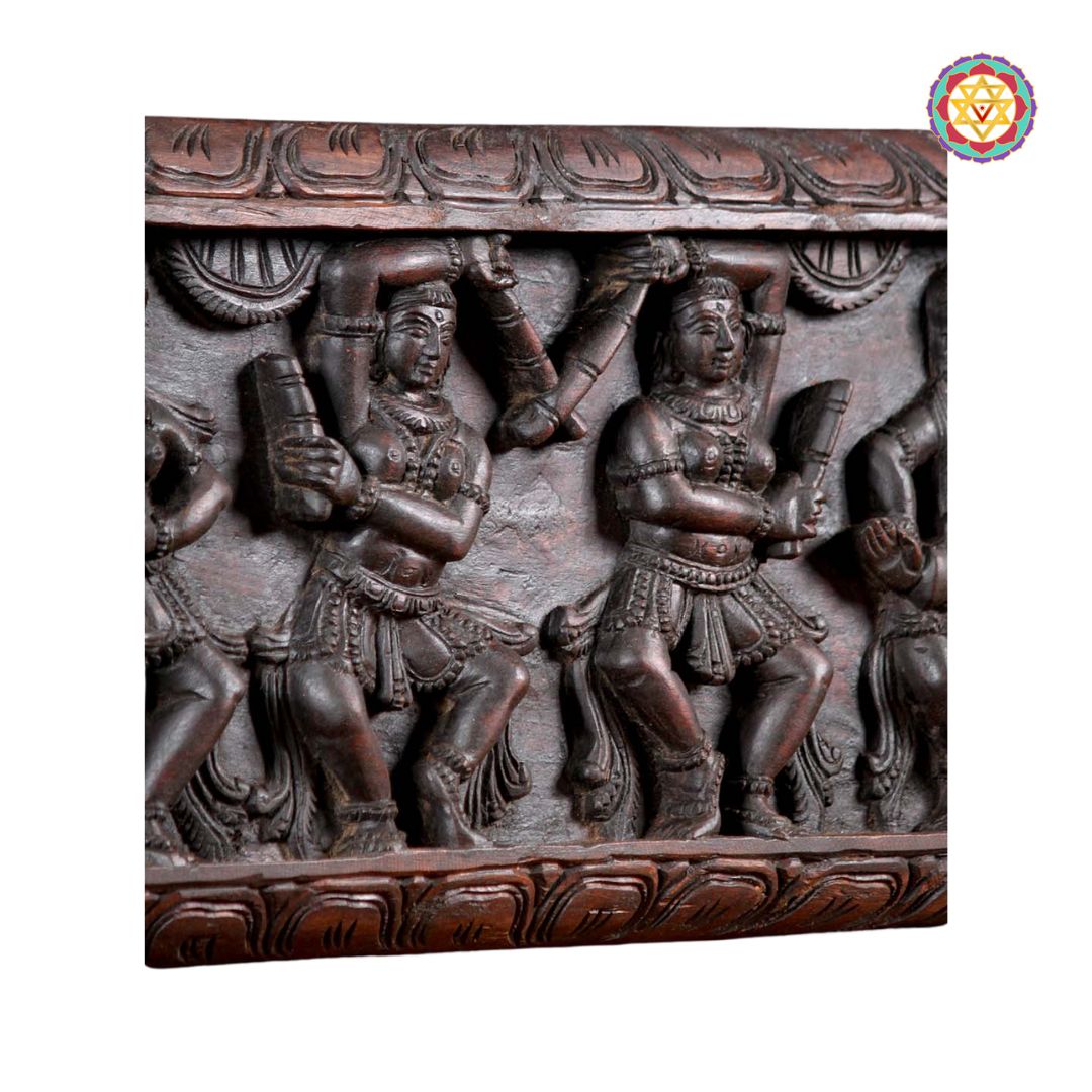 Traditional Indian dance carving on wooden wall panel