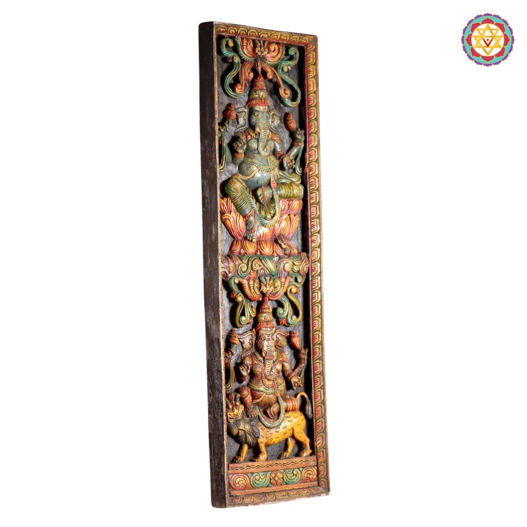Close view of Ganesha carving with yali figures and ornate floral work