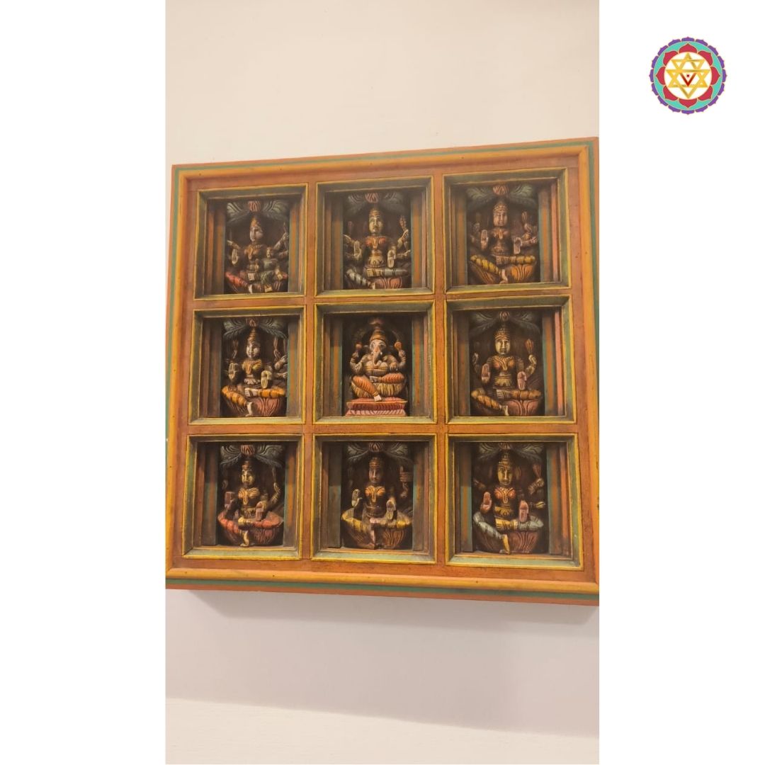 Side view of square Indian wall panel with 3x3 deity carvings