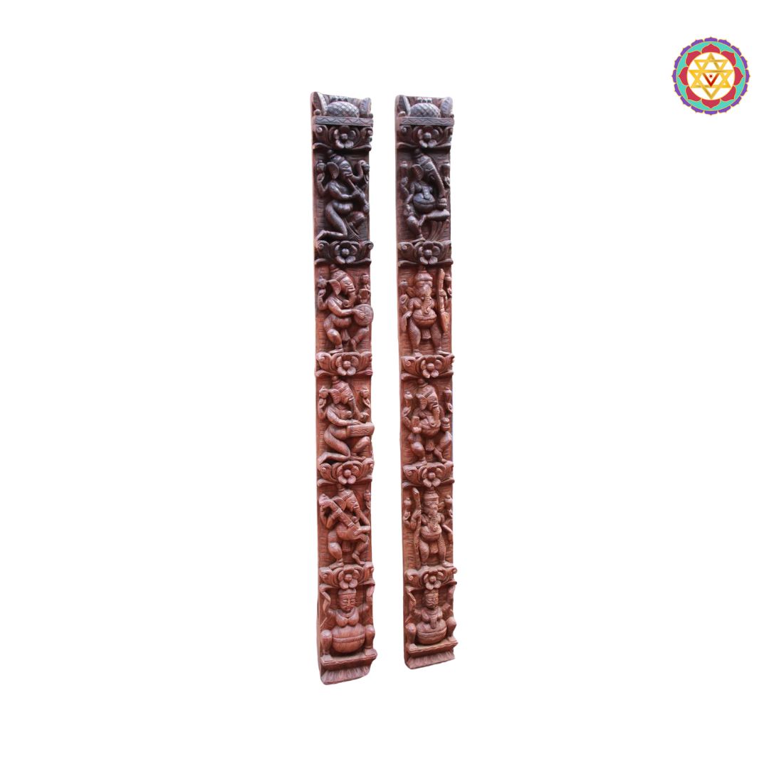 Two ornate, carved wooden sticks on a white background with a colorful emblem in the corner. Side-by-side musical Ganesha designs.