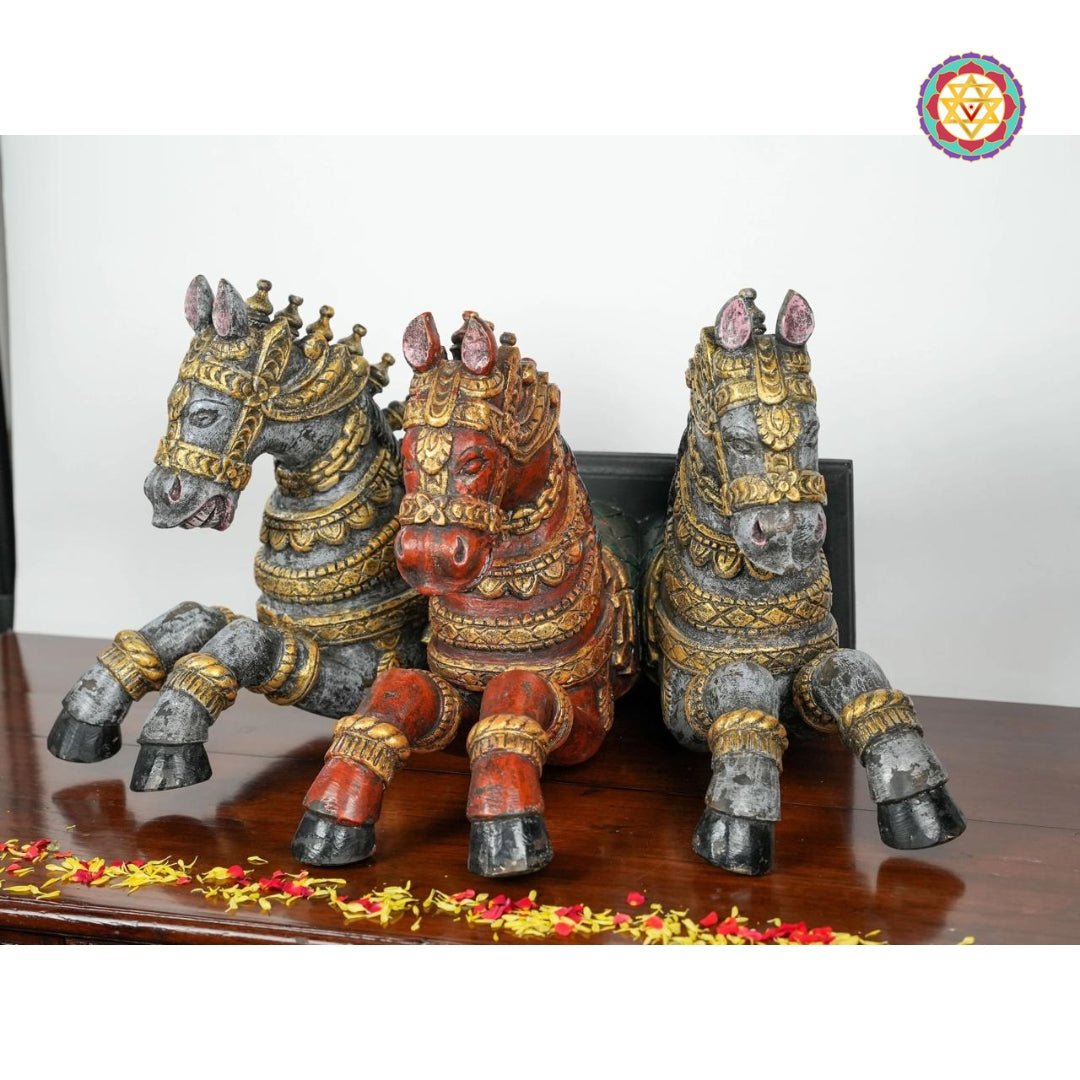 Side view of horse sculpture set mounted on wall in antique tones