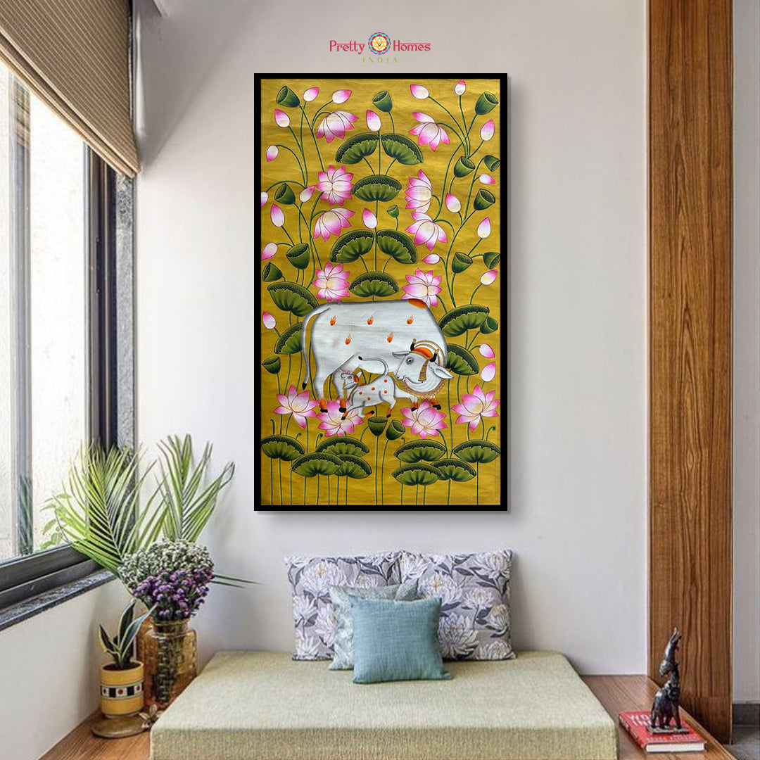 Hand-painted Pichwai with cow and calf in lotus pond, mustard background.
