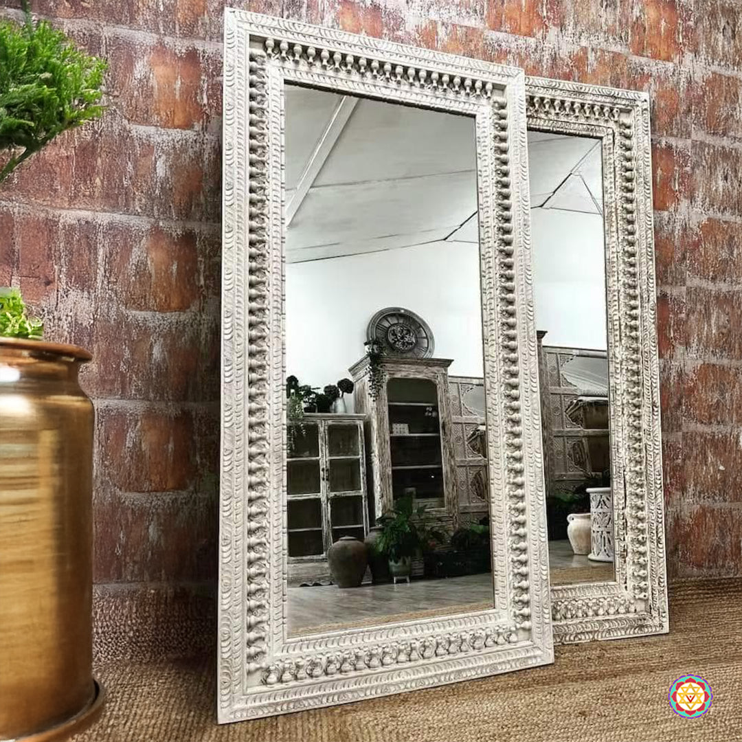 “Woodcarved spindle design mirror in rustic white finish – perfect for traditional home decor”
