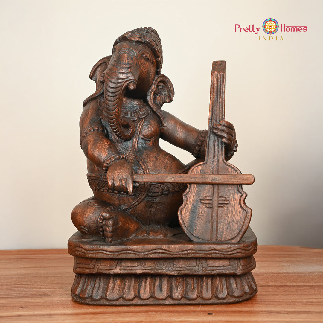 Woodcarved Ganesha Statue/Sculpture ,Playing Musical instruments (Single)