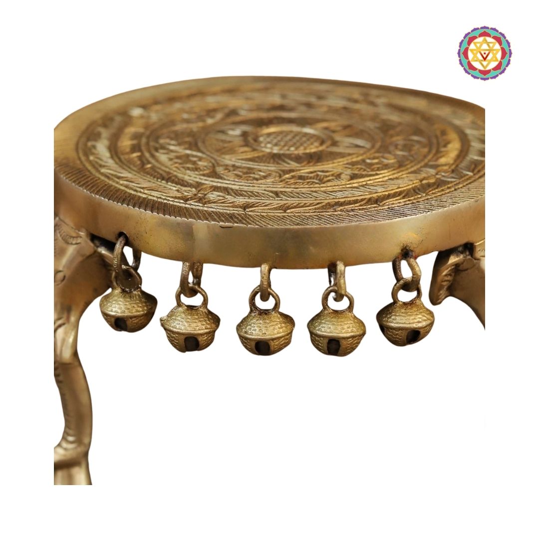 angled view of brass table top showing polished surface