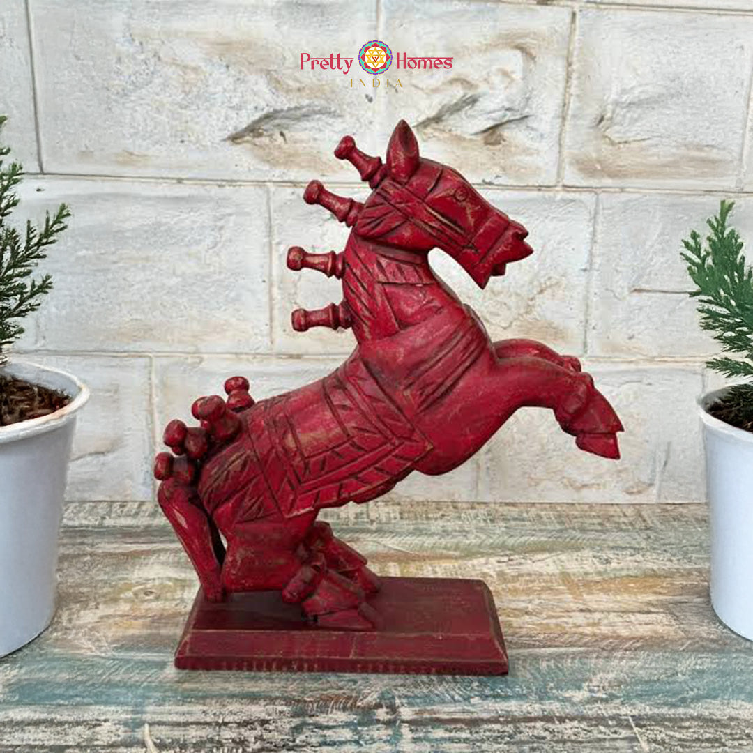 Handcrafted decorative wooden horse statue frontal view showing carving