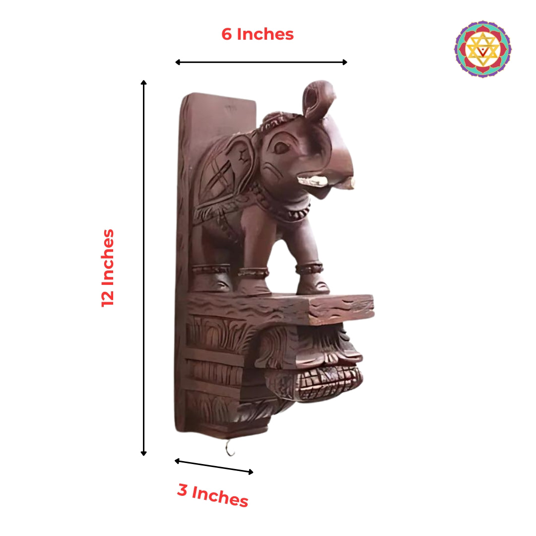 Carved wooden elephant corbel with decorative base and dimension markings 