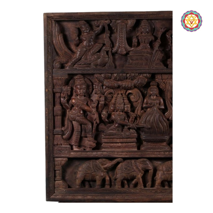 Traditional Indian wooden carved panel of Shiva Parvati wedding with intricate elephant motifs