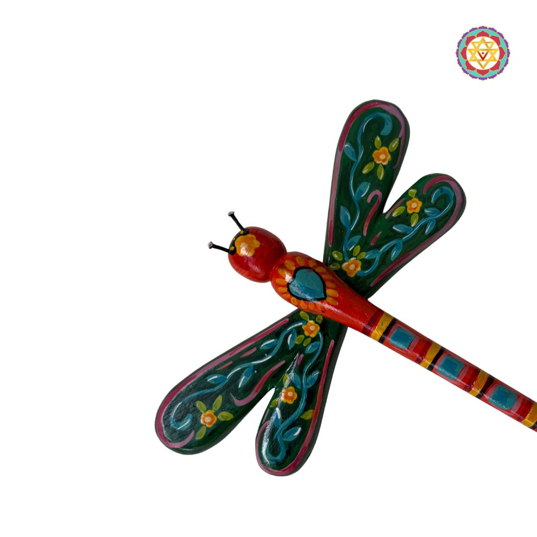 single wooden butterfly on plain background