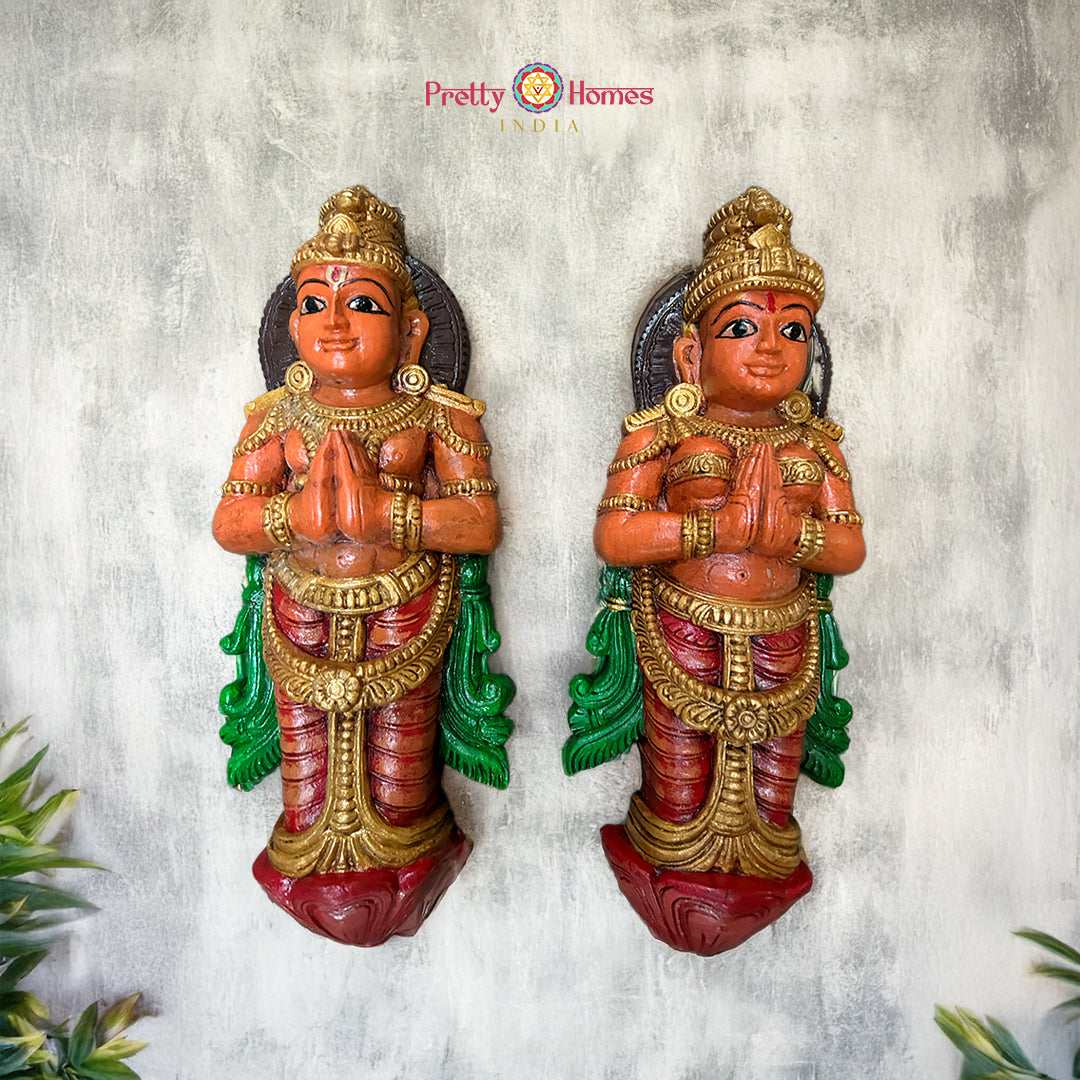 Hand-carved wooden wall sculptures of Lord Ram and Goddess Sita pair