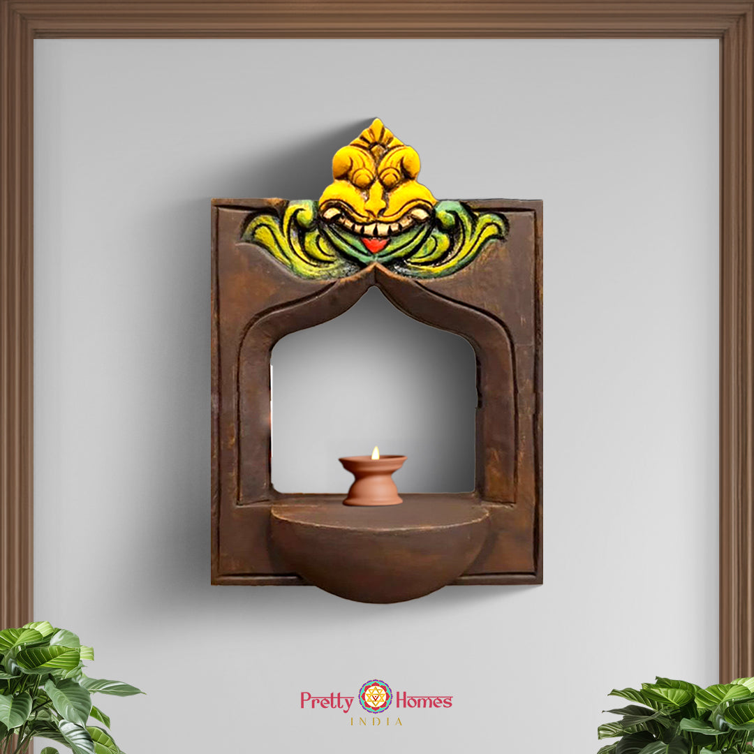 front view of hand-carved yali wooden frame displayed on a wooden stand showing the full sculpture and base in natural polished finish