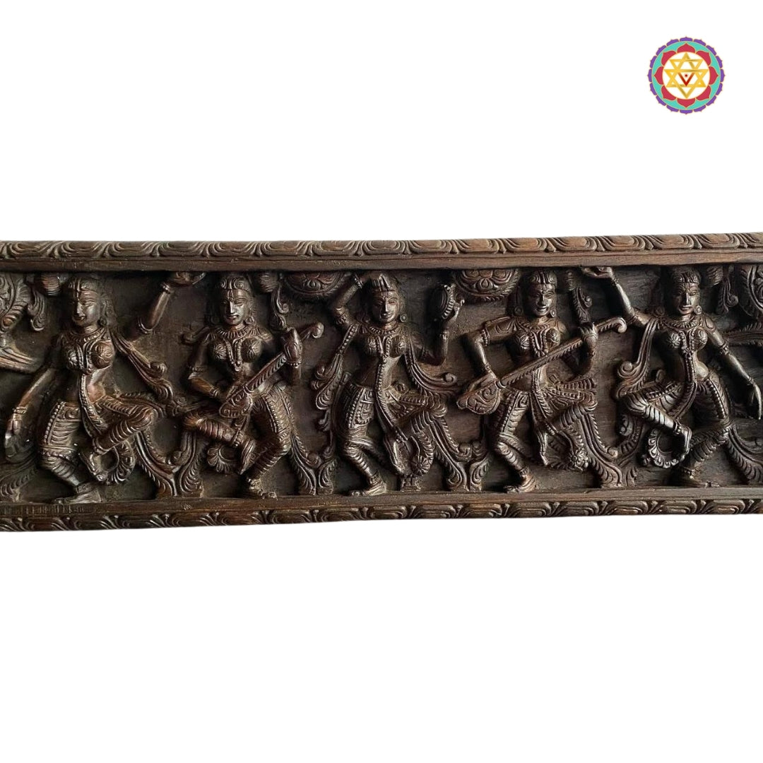 Carved wooden border detail on musical Apsara panel