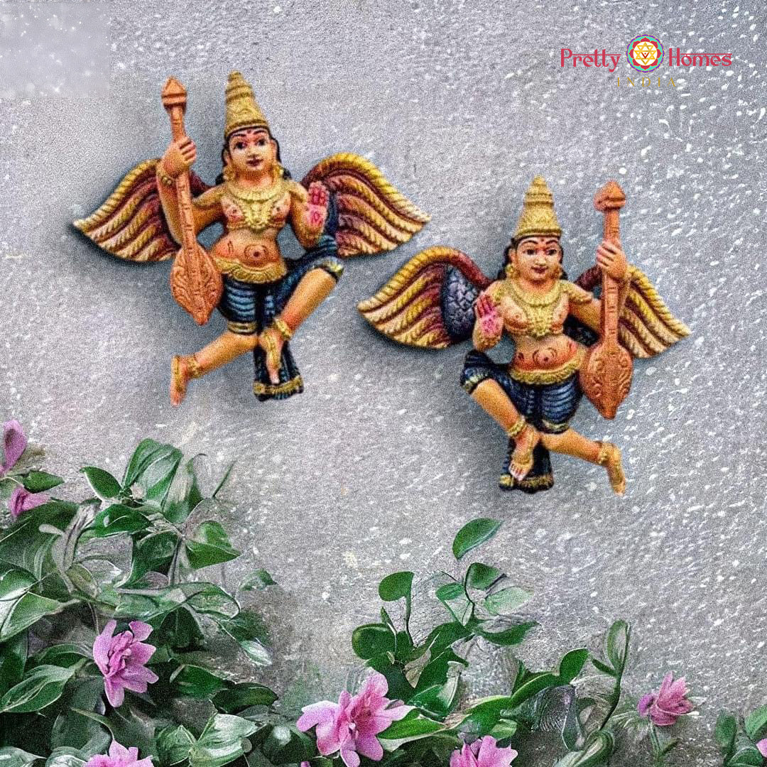 Gandharva angel carving — traditional handcrafted Indian wood decor.