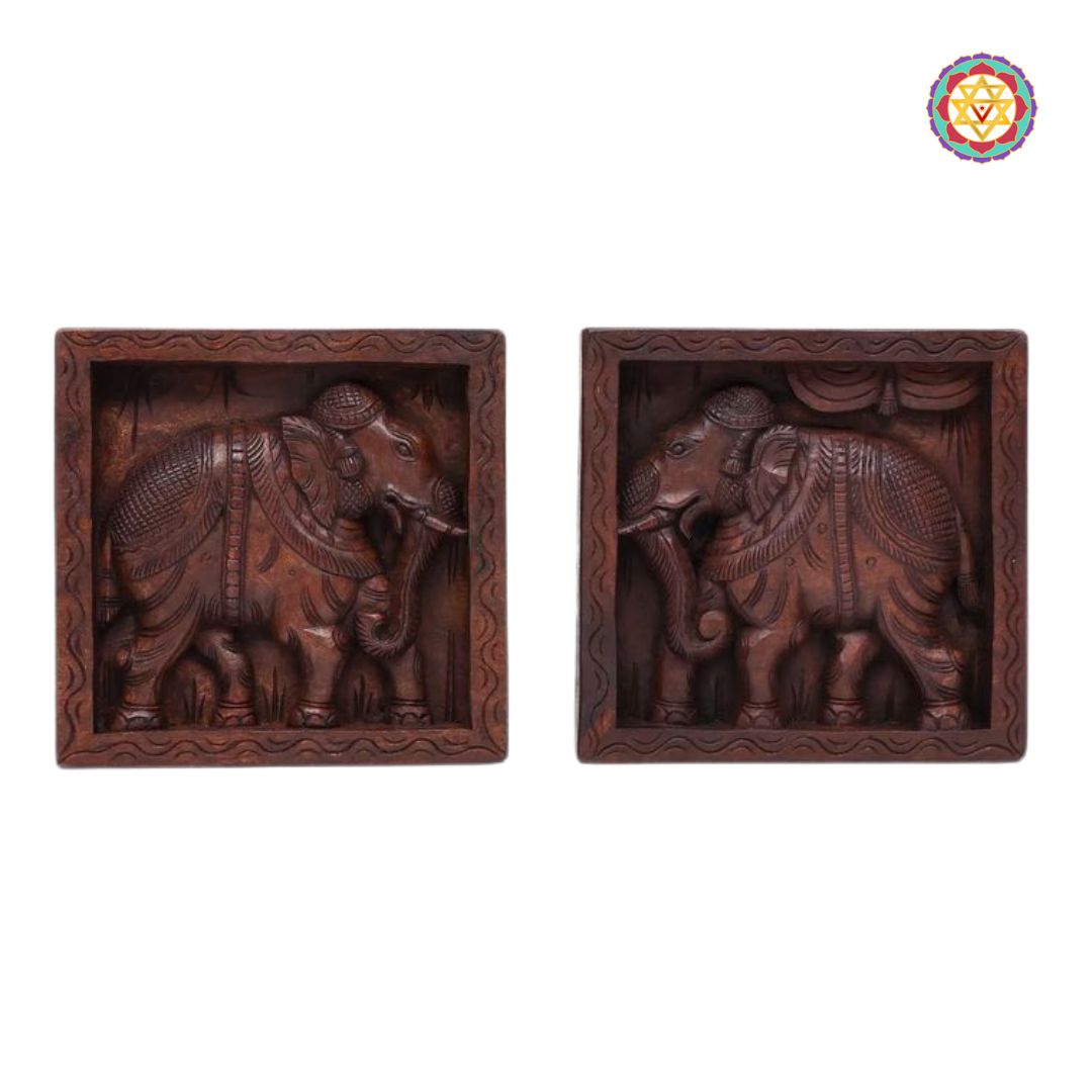 Front-facing view of both elephant designs with fine detailing