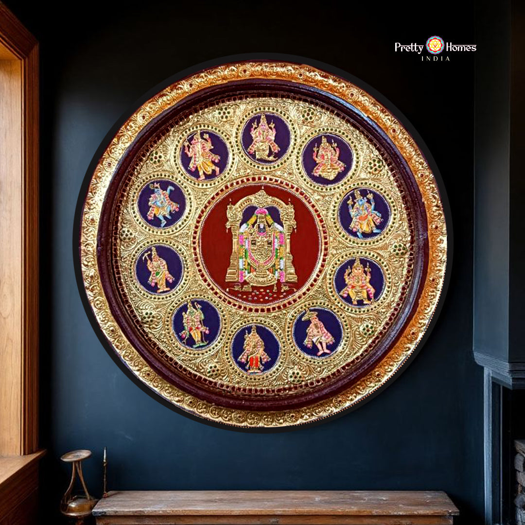 close-up of round tirupati tanjore showing gilded dashavatar motifs and polished teak frame